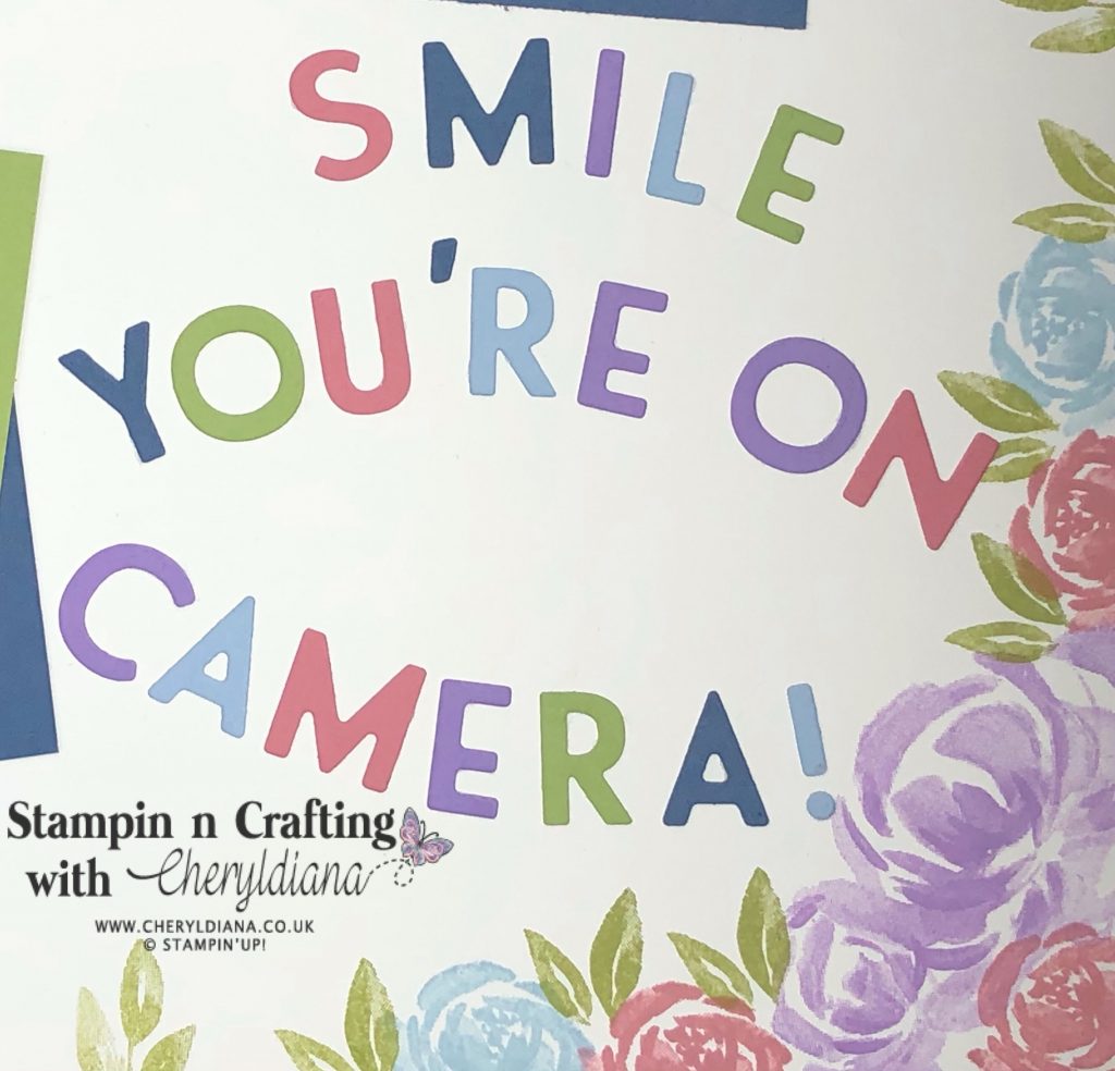 Die Cut Coloured 'Smile You're on Camera' title