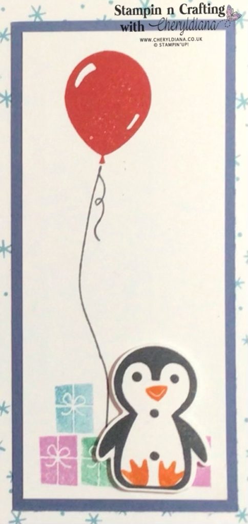 Photograph of Penguin holding Balloon for the Penguin Place Sale-a-Bration Sampler