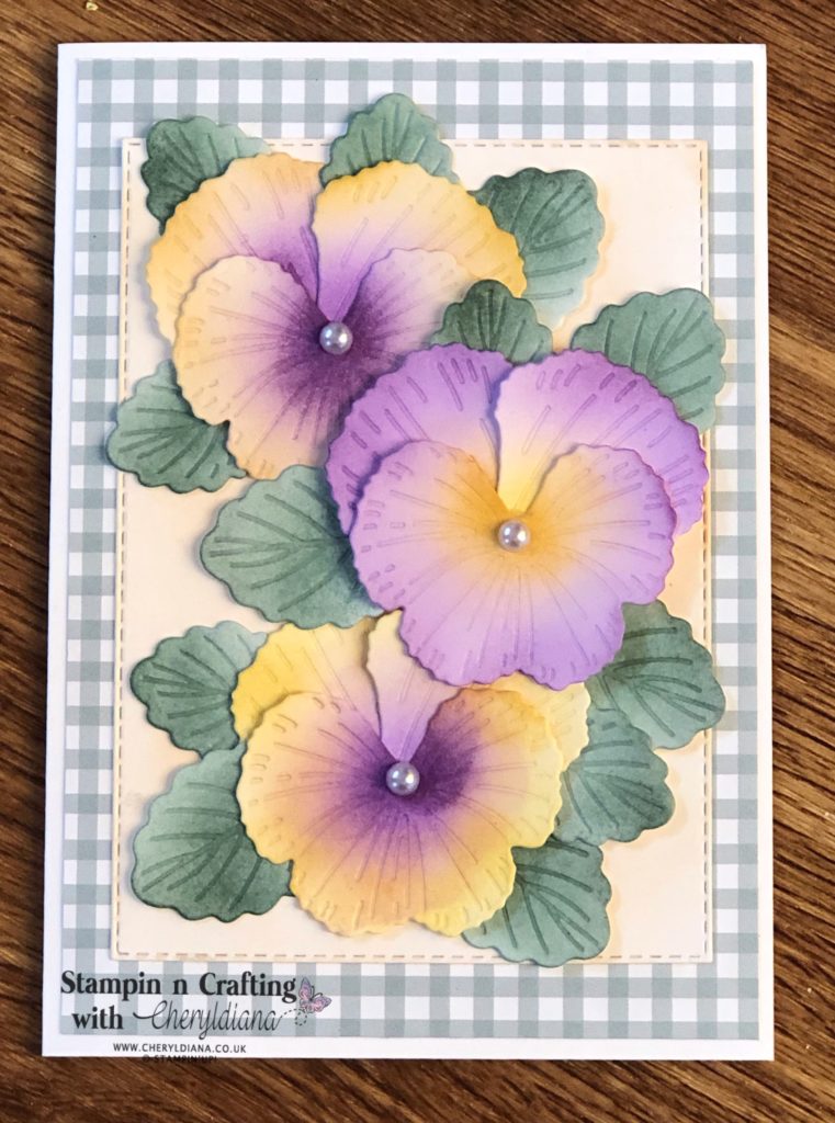 Photo showing you the finished card with flowers that have been coloured in using blending brushes