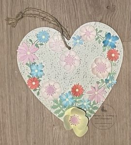 Photo of finished wooden heart with flowers made using painted watercolour card stock