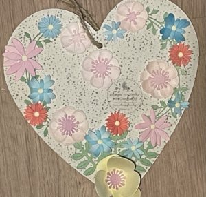 Photo of finished wooden heart with flowers made using painted watercolour card stock
